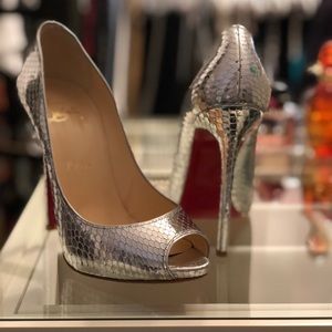 Christian Louboutin silver python peep toe pumps